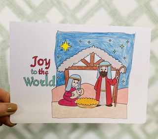 “Hand-colored nativity Christmas greeting card with ‘Joy to the World’ text”

“Bright floral illustrated Merry Christmas greeting card in colorful design”

“Rachael’s Greeting Cards boxed Christmas cards with hand-drawn holiday artwork”

“Colorful Christmas greeting card set featuring nativity and floral Merry Christmas designs”