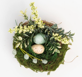 Easter nest with pastel eggs and faux spring flowers

Decorative Easter nest with moss, faux florals, and speckled eggs

Spring Easter nest décor with greenery and pastel eggs

Faux floral Easter nest centerpiece with decorative eggs