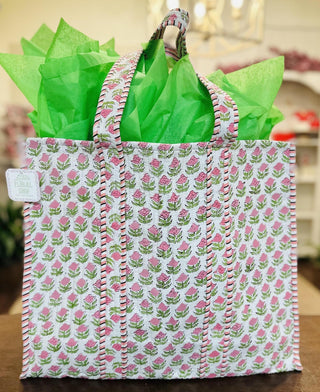 Cottage Rose quilted tote bag with pink floral print

Floral quilted tote bag with rose pattern and striped handles

Cottage Rose quilted tote bag filled with green tissue paper

Large quilted floral tote bag with soft pastel roses