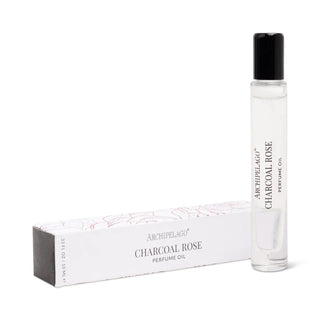 Archipelago Charcoal Rose bubble bath in glass bottle with wooden stopper