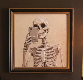 Halloween framed “Skelfie” textured wall art featuring a skeleton taking a selfie with a cell phone in a distressed black frame.