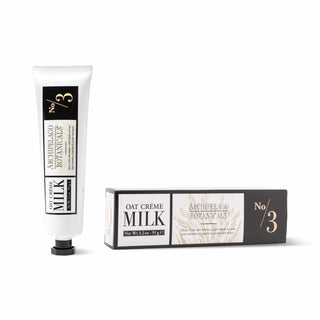 Archipelago Oat Milk body butter in glass jar with black lid