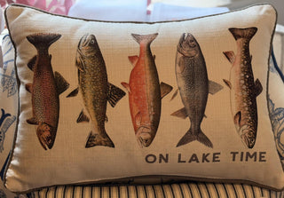 On Lake Time decorative throw pillow featuring vintage fish illustrations on a neutral background with dark piping.