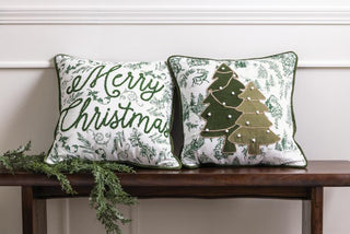 “Christmas toile pillow with green velvet piping and holiday appliqué design”

“Square cotton Christmas pillow with Merry Christmas script and tree appliqué”

“Holiday decorative pillow with velvet appliqué and French knot details”


