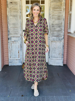 Amber Dress with bold geometric print and short sleeves

Geometric print button-front midi dress with pockets

Colorful patterned midi dress with relaxed fit and collared neckline