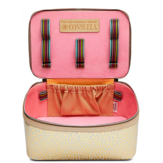 Consuela Kit Train Case with gold jag print foiled leather exterior and top handle

Open Consuela Kit Train Case showing pink vinyl interior and brush organizers

Gold jag print Consuela Kit Train Case cosmetic organizer with double zip closure

Consuela Kit Train Case travel makeup case with structured interior and mesh pocket