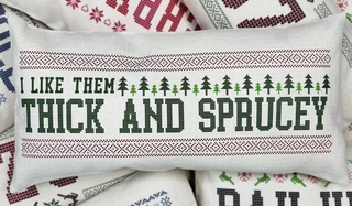 I Like Them Thick and Sprucey pillow with green cross-stitch design on beige fabric

Funny Christmas pillow with forest tree cross-stitch pattern

Beige holiday pillow with I Like Them Thick and Sprucey lettering

Rectangular pillow with stitched evergreen design and festive text

Humorous Christmas décor pillow featuring pine tree embroidery