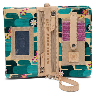 Consuela Dezi Uptown Crossbody with colorful floral embroidery, turquoise pattern, and adjustable woven crossbody strap