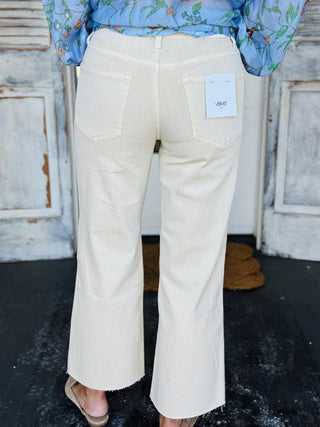 White Swan high rise crop wide leg jeans in soft white denim with raw hem

High rise cropped wide leg white jeans with comfort stretch denim

White cropped wide leg jeans featuring clean raw hem and five-pocket design

Model wearing White Swan high rise wide leg cropped jeans in white

Wide leg crop jeans in white with high waist and relaxed silhouette
