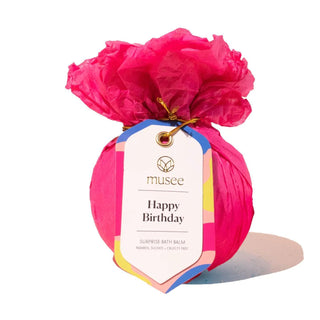 Musee Happy Birthday bath balm wrapped in colorful tissue with gift tag
