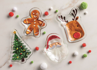 Christmas Glass Tidbit Plates featuring hand-painted figural glass designs including Santa, Christmas tree, gingerbread cookie, and reindeer, approximately 5" x 4".