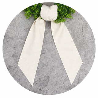 Decorative wreath sash with gingham fabric and scalloped trim close up