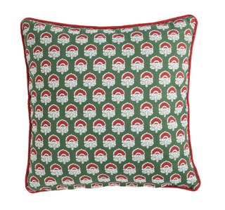 Double-sided quilted block print pillow featuring a red floral pattern on one side and a green geometric floral pattern on the reverse with red piped edging.
