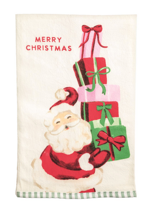Cream cotton Christmas hand towel featuring a whimsical Santa carrying a stack of colorful presents, "Merry Christmas" sentiment, and a green gingham hem.