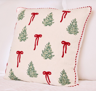 Cream pillow with red bows and green Christmas tree embroidery

Holiday square pillow with festive bow and tree design

Christmas decorative pillow with boucle embroidery and bead details

Red and green embroidered Christmas pillow with zipper closure

Festive holiday throw pillow with red piping and Christmas trees