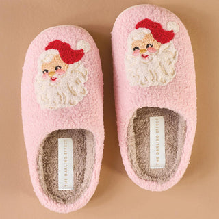 “Pink fuzzy slippers with embroidered Santa faces”

“Santa fuzzy holiday slippers in pink”

“Women’s pink Christmas slippers with Santa design”

“Cozy fuzzy slippers with Santa embroidery”

“Pink slip-on Santa slippers with hard sole”