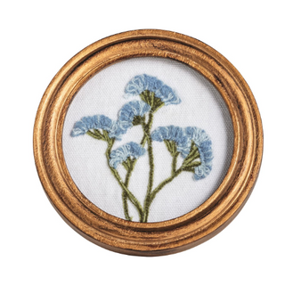 Framed floral embroidery in gold wooden frame