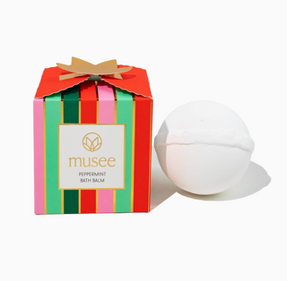 Musee Peppermint & Rosemary Bath Balm with striped holiday gift box

Musee peppermint bath balm and packaging with colorful festive stripes

White Musee bath balm next to red and green striped holiday box

Musee peppermint and rosemary bath balm displayed with gift-ready packaging