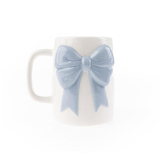 White ceramic mug with raised blue bow detail

Blue bow mug with glossy white finish

Elegant ceramic coffee mug with 3D blue bow

White and blue bow mug for everyday or holiday use

Ceramic mug featuring sculpted pastel blue bow design
