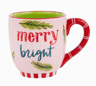 Pink Merry & Bright vintage-style mug with red handle and holiday greenery

Holiday ceramic mug with “Merry & Bright” lettering and festive hand-painted design

Red and pink Christmas mug with greenery accents and striped base

Festive Merry & Bright ceramic mug with bright colors and vintage charm