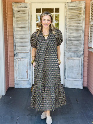 Black floral puff sleeve dress with pink and green print

Mallory Dress in black featuring pink floral pattern and gathered neckline

Black and olive floral long dress with vintage-inspired print