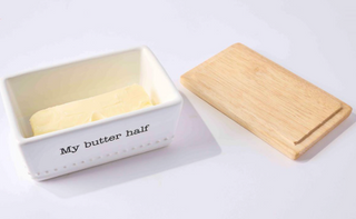 Butter Dish Set with a debossed ceramic butter dish, wooden lid with spreader slot, and included silverplate butter spreader.