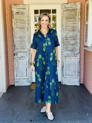 Navy floral button-front midi dress with short sleeves

Opal Dress with green floral print and side pockets

Lightweight floral midi dress with collared neckline
