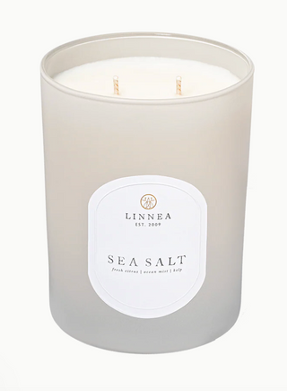 Linnea Sea Salt candle in gray glass vessel with double cotton wicks