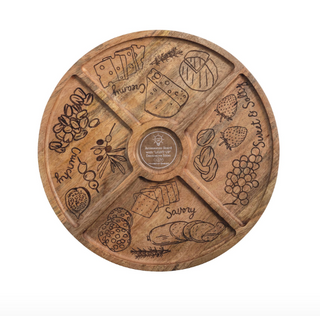 Engraved mango wood charcuterie board with four serving sections