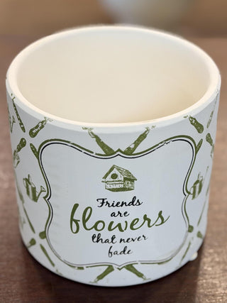 White ceramic garden cachepot with green botanical pattern and inspirational gardening quote, 6-inch decorative planter.