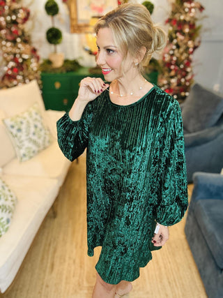 Emerald green velvet long sleeve dress with sash belt

Victoria Velvet Dress in green with bubble sleeves and flare skirt

Green velvet holiday party dress with tie waist and keyhole back

Elegant velvet dress for Christmas or evening events

Soft green velvet flare dress with long sleeves and belted waist