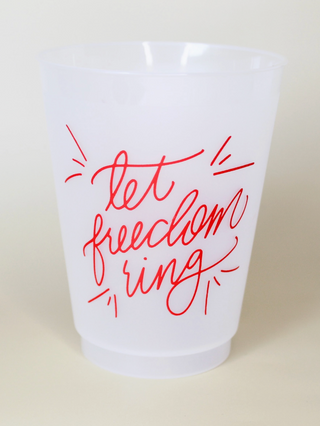 Let Freedom Ring reusable frosted cup with red patriotic script design on a white frosted 16 oz cup.