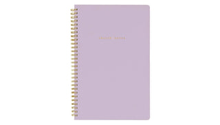 Open church notes journal with lined sermon pages and verse sections