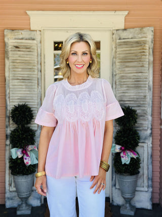 Pink mesh babydoll blouse with short sleeves and lace applique