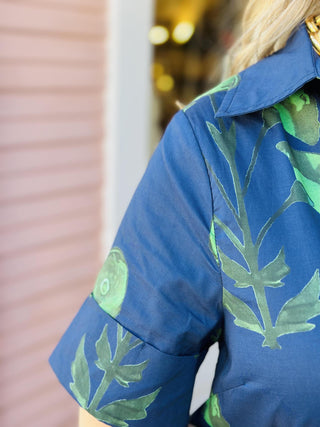 Navy floral button-front midi dress with short sleeves

Opal Dress with green floral print and side pockets

Lightweight floral midi dress with collared neckline