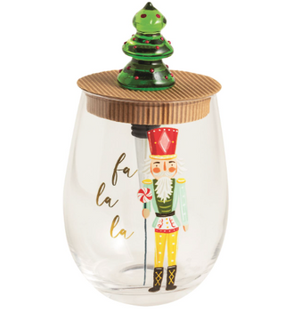 Tree Nutcracker stemless wine glass with green tree bottle stopper

Holiday nutcracker wine glass and Christmas tree topper set

“Fa La La” wine glass with festive nutcracker and tree stopper

Christmas drinkware set with nutcracker and holiday tree accent

