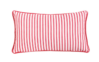 Quilted lumbar pillow featuring festive Christmas tree block print on the front, red striped reverse, red piping, and zipper closure.