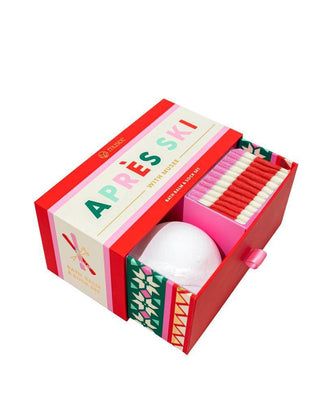 Musee Après Ski Bath Balm & Sock Set with colorful drawer box

Après Ski gift set with white bath balm and red striped cozy socks

Musee winter bath balm and sock set in festive holiday packaging

Drawer-style Après Ski gift box containing bath bomb and soft socks