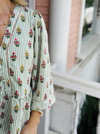 Janie top with green stripes and floral print