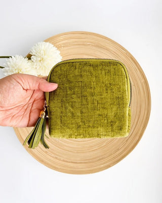 Velvet Travel Pouch in olive green with gold zipper and decorative tassel