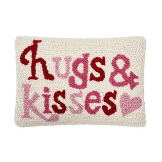 Hugs and Kisses hook pillow with pink and red lettering