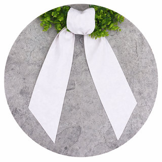 Decorative wreath sash with gingham fabric and scalloped trim close up