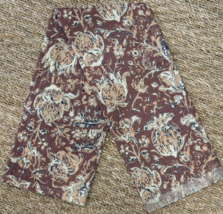 Burgundy floral cotton tea towel with vintage botanical print and fringed edge