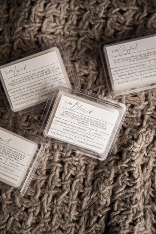 Freedom Studios Wax Melts with mandarin, bergamot, jasmine, and white tea

Hand-poured soy blend wax melts made by survivors

Freedom Studios 2oz wax melt with uplifting citrus and floral notes

Soy blend wax melts in clean packaging by Freedom Studios