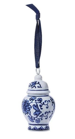 Blue and white porcelain temple jar ornaments with navy hanging ribbons and chinoiserie floral patterns.