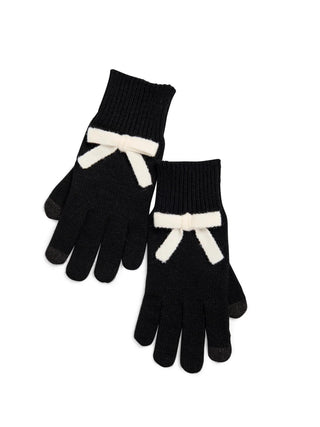 Black touchscreen gloves with white bow detail

Knit winter gloves with cream bow accent

Black touchscreen gloves with bow trim

Chic black knit gloves with touchscreen tips

Cozy black gloves with ivory bow decoration
