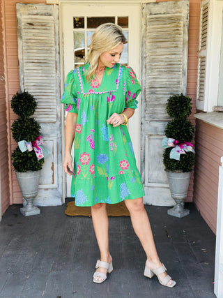 Green multi-color floral Angelica Dress with V-neckline and scalloped trim