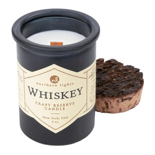 Whiskey Reserve Candle in matte black glass jar with natural cork lid