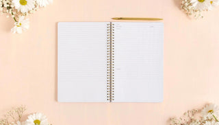 Open church notes journal with lined sermon pages and verse sections