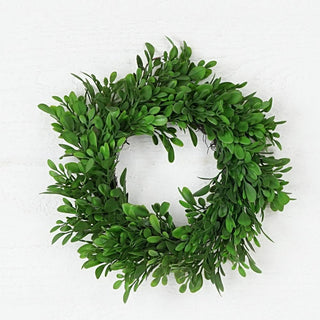 9-inch evergreen boxwood wreath with lush green leaves

Small artificial boxwood wreath for candle or home décor

Faux greenery wreath centerpiece with realistic boxwood leaves

Decorative 9-inch wreath with natural green boxwood look

Evergreen boxwood candle ring wreath for table or shelf